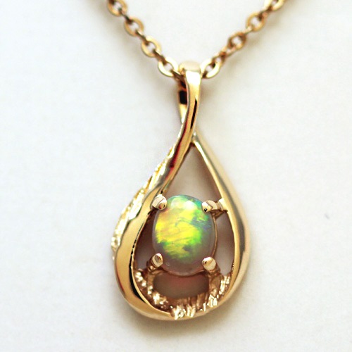 14k Yellow Gold Pendant with a SOLID SEMI BLACK OPAL Broad rolling flash of neon bright fire